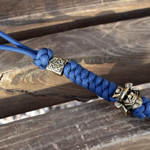 Фото темляк / брелок из паракорда с бусиной валькирия