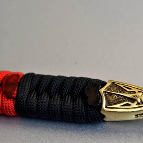 Фото плетеный темляк для ножа