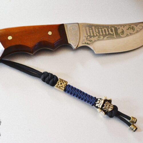 Фото темляк на нож из паракорда с бусинами